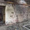 Interior.  View of entrance to burner rooms in burning sorting house.