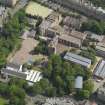Oblique aerial view centred on Bruntisfield House with High School and Primary School adjacent, taken from the SW.