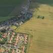 Oblique aerial view of the cropmarks of the settlements, taken from the WNW.