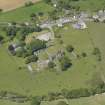 General oblique aerial view of Dundrennan Abbey, taken from the SE.