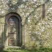 Detail of main doorway and arched window on S elevation of Cruggleton Old Parish Church