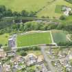 Oblique aerial view of Annan Athletic Football Club, taken from the SE.