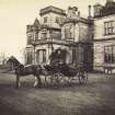 View of a horse and carriage outside the front of Whitehill House, Rosewell.
