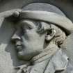 Detail of portrait sculpture on monument in memory of John Runciman (died 1768). Located at Canongate Cemetery.