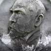 Detail of portrait sculpture on monument in the Grange Cemetery.