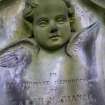 Detail of cherub sculpture on monument in memory of Sarah Martin. Located at Warriston Cemetery.