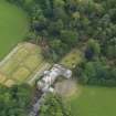 Oblique aerial view of Galloway House and formal garden, taken from the NW.
