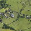 Oblique aerial view of Whithorn Parish Church and priory, taken from the NNE.