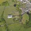 Oblique aerial view of Whithorn Parish Church and priory, taken from the SW.