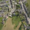 General oblique aerial view of  Whithorn centred on St John's Church and Mansefield, taken from the NNE.