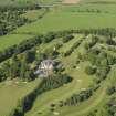Oblique aerial view of Ratho Park country house and golf course, taken from the WSW.