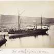 View of Colonsay harbour with ship.
Titled: 'Jura at Colonsay Quay, Manse in the distance'. 

