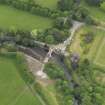 Oblique aerial view of Eglinton Country Park footbridge and formal garden, taken from the NNW.