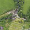 Oblique aerial view of Eglinton Country Park footbridge and formal garden, taken from the WSW.