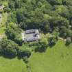 Oblique aerial view of Montgreenan Mains farmhouse, taken from the NW.