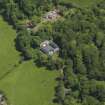 Oblique aerial view of Montgreenan Mains farmhouse, taken from the WSW.