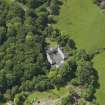 Oblique aerial view of Montgreenan Mains farmhouse, taken from the NE.