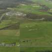 Oblique aerial view of the quarries on Leeon with the Heddle Hill limestone quarry beyond, looking S.