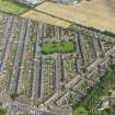 Oblique aerial view centred on the village, taken from the WSW.