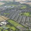 General oblique aerial view centred on the village, taken from the NE.