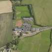 Oblique aerial view centred on the school/community centre with the primary school adjacent, taken from the W