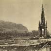 View of the Scott Monument, Edinburgh, from east and Princes Street with Edinburgh Castle and the Mound in the background.