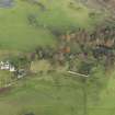 Oblique aerial view centred on the remains of the country house, taken from the S.