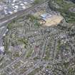 Oblique aerial view of  the Crown area of Inverness centred on the former Royal Academy, taken from the SW.