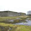 General view from NW of magazine and repair shed.