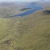 General oblique aerial view looking down the Abhainn a' Chadh' Bhuidhe to Loch Fannich, taken from the WNW.