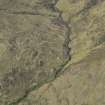 General oblique aerial view of Gleann Tanagaidh centred on the enclosure, taken from the S.