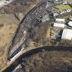 Oblique aerial view of M74 extension centred on the Dalbeth Bridge, leading to the Fullerton Road Junction (NS 6408 6239), taken from the ENE.
