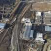 Oblique aerial view of the M74 extension going through the Polamadie area to the M74 centred on Gushetfaulds railway junction, taken from the ESE.