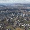 General oblique aerial view of Glasgow city centre, looking west to Dumbarton, taken from the E.