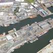 Oblique aerial view of the harbour and docks at Aberdeen, taken from the WSW.
