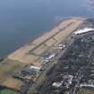 General oblique aerial view centred on the airport, taken from the NE.