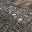 General oblique aerial view centred on the industrial estates, taken from the SE.