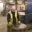 Interior. Cask Rejuvination Process. Charring Area. Cooper checks that original end or head fits the cask after charring. If not, the end will be recut.