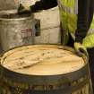 Interior. Cask Rebuilding Process. Cask has wax painted on the head where it meets the chime at the croze. This replaces the use of flags or reeds.