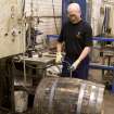 Interior. Cask Rebuilding and Rejuvination Process. Cask Testing. A cask being tested after its second hoop drive for watertightness. Water is added under prossure to show up any leakage. If leakage occurs, the cask is left overnight until the wood swells and the gaps close up.