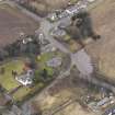 Oblique aerial view centred on the church, taken from the SW.