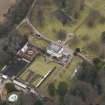 Oblique aerial view centred on the country house, taken from the SW.