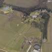 General oblique aerial view centred on the country house, taken from the NE.