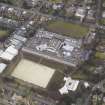 Oblique aerial view centred on the school, taken from the SE.