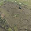 Oblique aerial view of the remains of Dun Colbost broch, taken from the SSW.