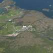 Oblique aerial view centred on Plockton school, station and airfield, taken from the SE.