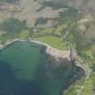 Oblique aerial view of Ardarroch and Ardoch centred on the fish traps in the bay, taken from the WSW.