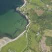 Oblique aerial view of Ardoch and Ardarroch centred on the fish traps in the bay, taken from the SE.