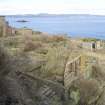 View from S shoing collapsed huts with No.2 gun emplacement and Battery Observation Tower.