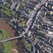Oblique aerial view centred on the High Street with the Bridge of Annan adjacent, taken from the WSW.